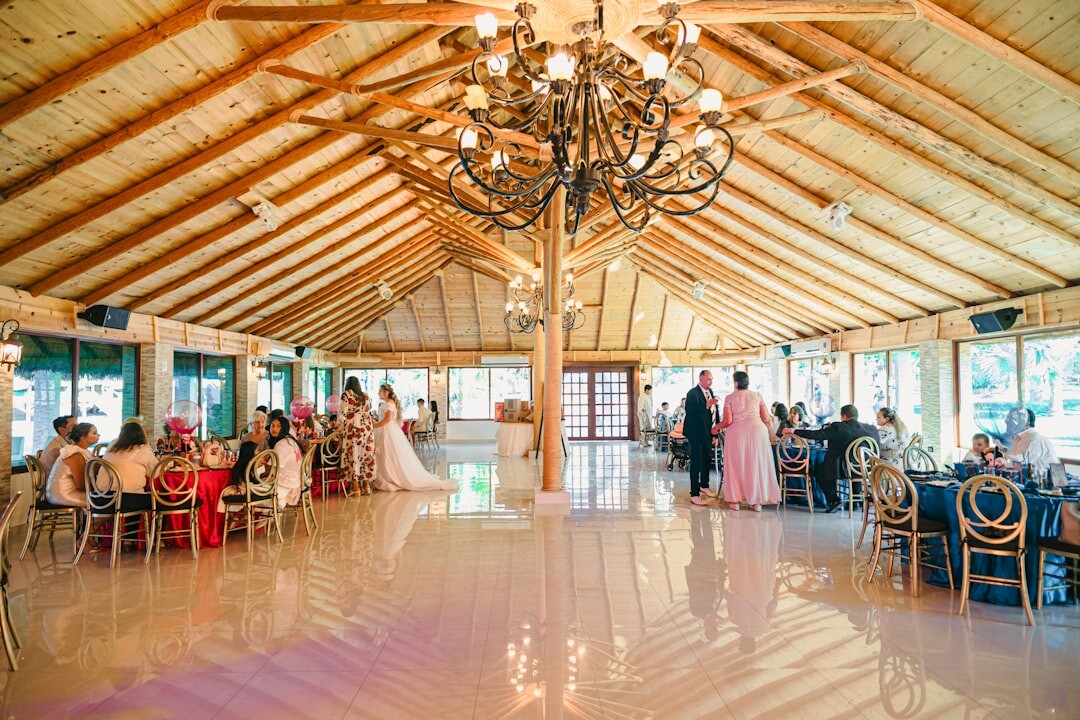 Senior couples dancing together in a community hall
