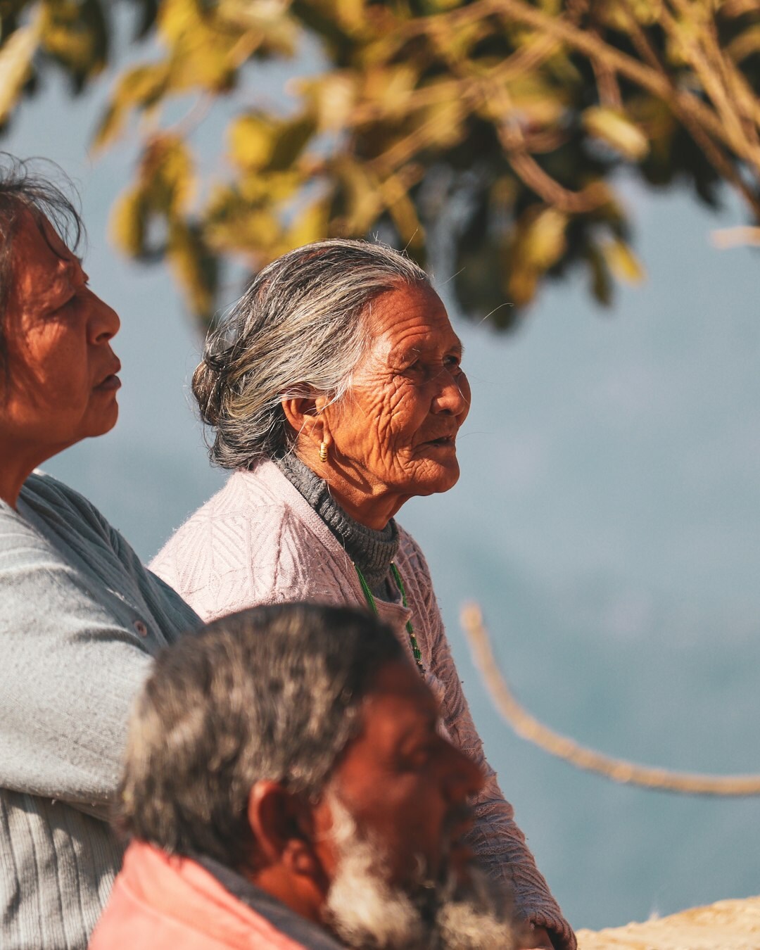 elderly people laughing together