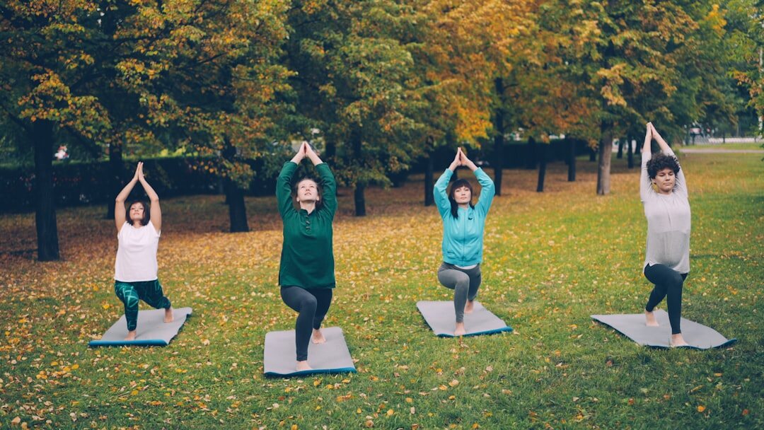 seniors doing gentle yoga outdoors